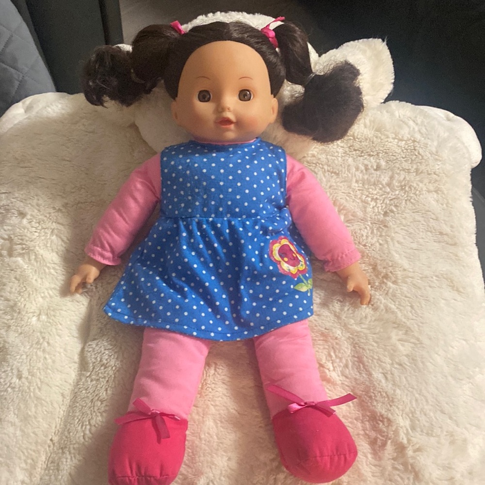 A rag doll with a rubber head